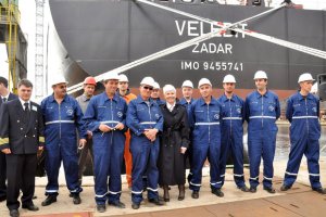 Rijeka, April 14 2011 - shipyard workers accompanied by Prime Minister Kosor taking photo for the memories in front of tanker 